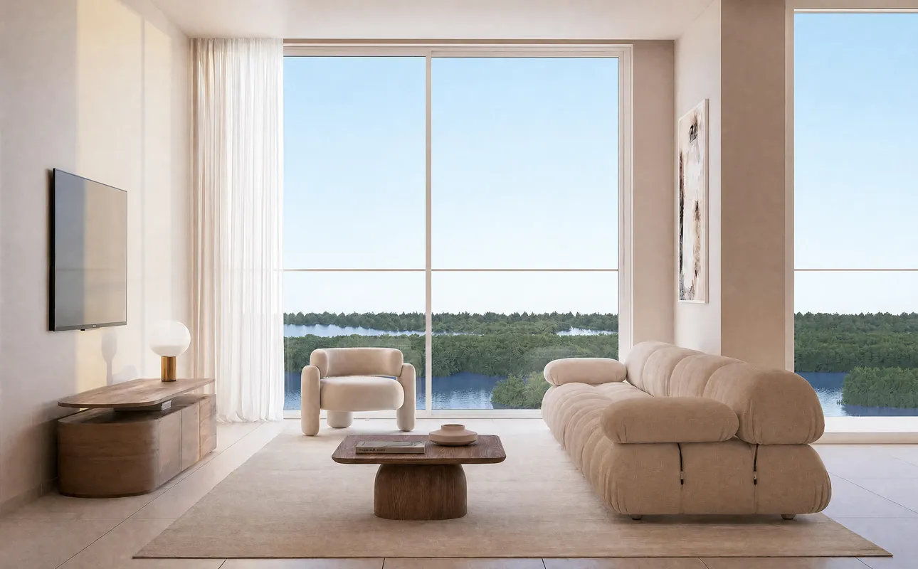 Bright waterfront living room in a one-bedroom apartment at Creekside Residence, Al Zorah
